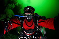 An underwater selfie of myself swimming along a wall fill... by Mazyar Jalayer 